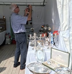 holding item at flea market