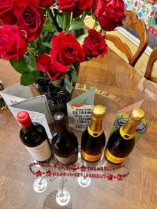 table with roses and champagne for retirement party